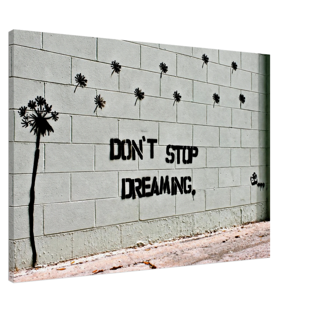 Angled close-up of the Banksy Don't Stop Dreaming stretched canvas and side edge.