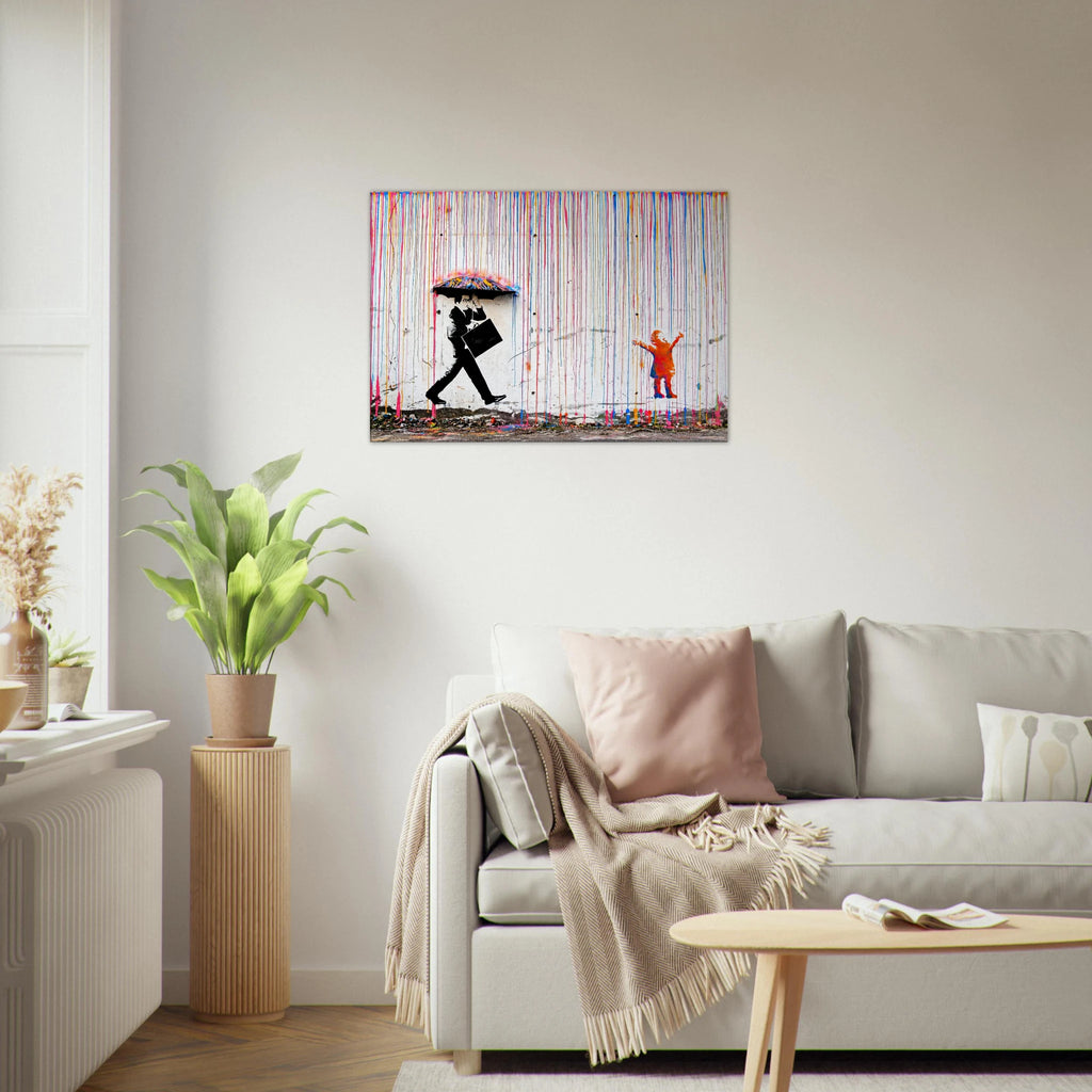 Banksy Rainbow Rain wall art displayed in a bright neutral living room with pale furniture