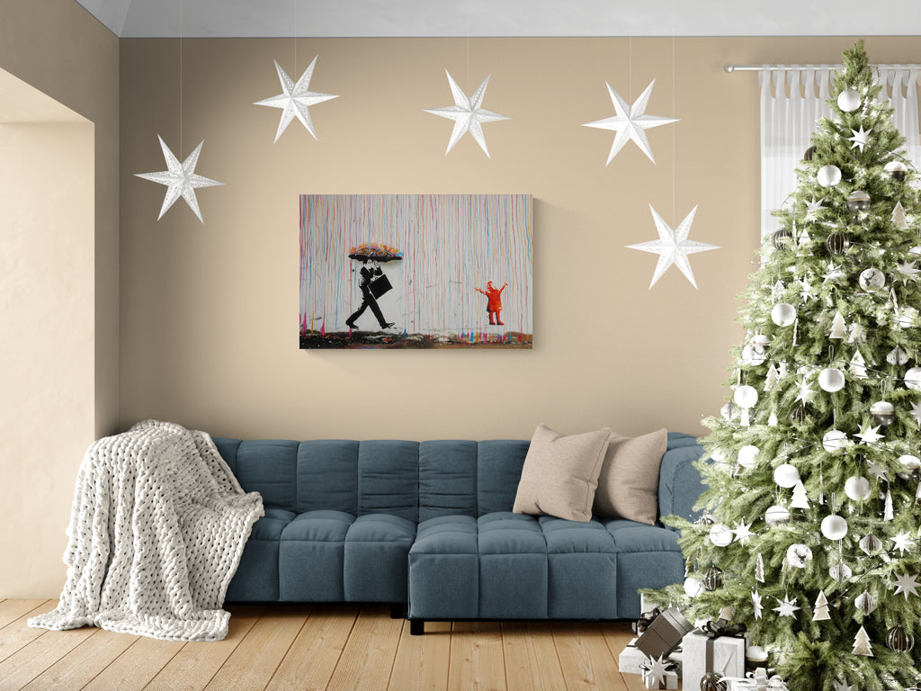 Colourful Rainbow Rain street art canvas displayed above a blue sofa in a contemporary living room