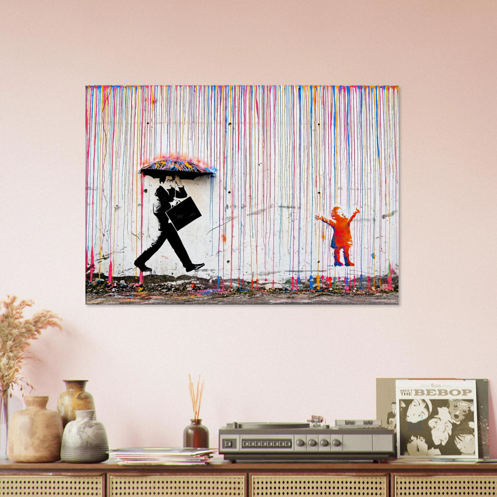 Colourful Rainbow Rain graffiti canvas on a soft blush wall above a wooden console